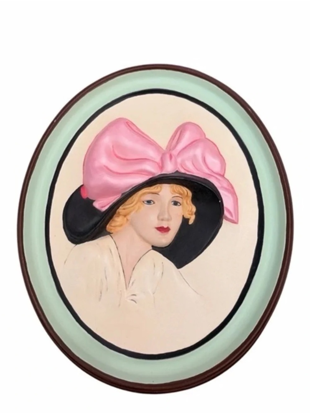 Framed Oval Art Plaque Featuring Woman in Black Hat with Pink Bow